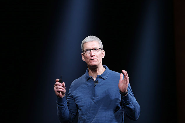 (FILES): This October 23, 2012 file photo shows Apple CEO Tim Cook addressing an Apple special event at the California Theatre in San Jose, California. Apple chief Tim Cook slammed what he called a wave of 