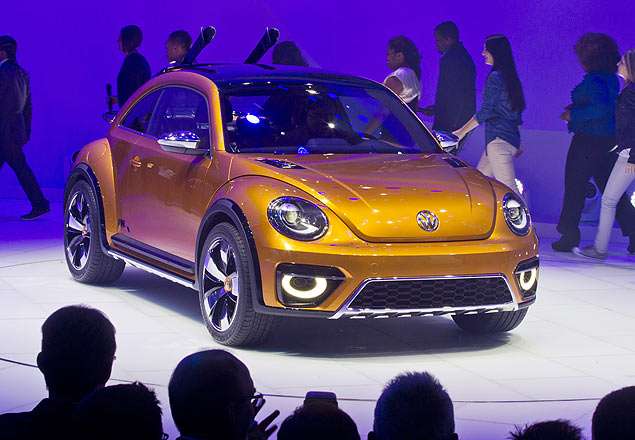 The Volkswagen Beetle Dune concept car is unveiled, Monday, Jan. 13, 2014, at the North American International Auto Show in Detroit, Mich. (AP Photo/Tony Ding) ORG XMIT: MITD118
