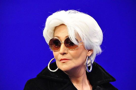 Sonia Abrão como Miranda, de "O Diabo Veste Prada"