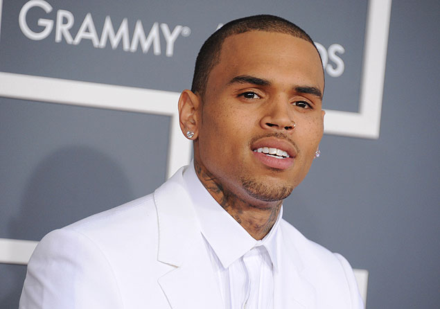 FILE - In this Feb. 10, 2013 file photo, Chris Brown arrives at the 55th annual Grammy Awards, in Los Angeles. Brown on Wednesday Nov. 6, 2013, countersued a man who claimed the R&B singer injured him during a fight outside a recording studio earlier this year. Brown's suit seeks unspecified damages and claims Sha'keir Duarte punched and kicked him during the fight. (Photo by Jordan Strauss/Invision/AP, File) ORG XMIT: NYET406