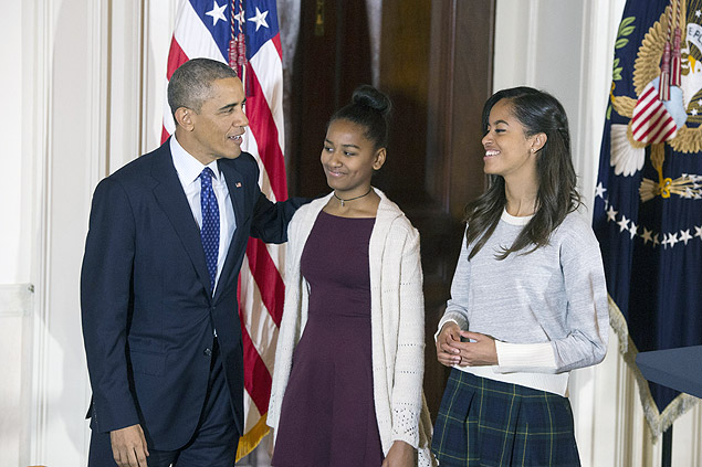 O presidente americano Barack Obama com as filhas Sasha (ao centro) e Malia
