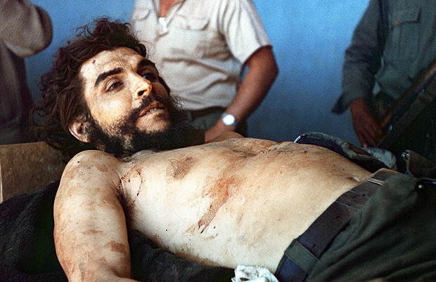 File pictures taken on October 10, 1967 by AFP journalist Marc Hutten of the body of Argentine-born guerrilla leader Ernesto 