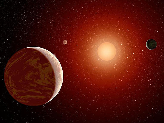 Três planetas se movem em torno d euma estrela anã vermelha na ilustração divulgada pelo site da Nasa