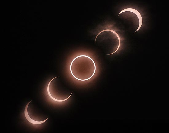 Montagem de fotos mostra as várias etapas do Sol sendo coberto pela Lua durante o eclipse; veja mais fotos
