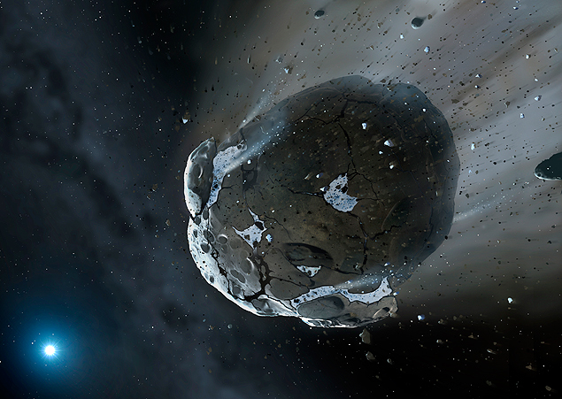 Ilustração mostra asteroide rochoso e rico em água sendo destruído pela forte gravidade da estrela anã-branca GD 61. 