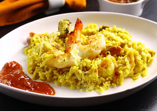 Kadgery indien (risoto de frutos do mar ao molho de curry gratinado), um dos pratos servidos em festival