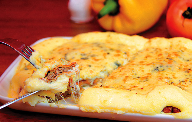 Fil-mignon  parmegiana com queijo parmeso, gorgonzola, mozarela e catupiry da Casa do Parmegiana