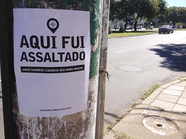 Cartazes espalhados por vtimas de assaltos nas ruas de Porto Alegre; ideia  alertar sobre o grande nmero de casos de violncia na regio
