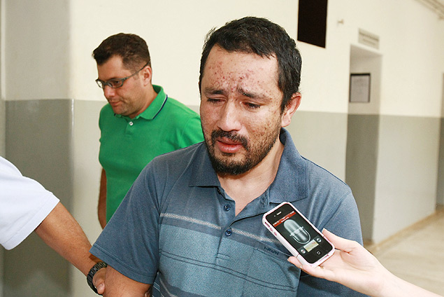 Alexsandro Ishisato Azevedo, que atropelou e matou o jovem Marcos Delefrate, 20, d entrevista em delegacia de Ribeiro