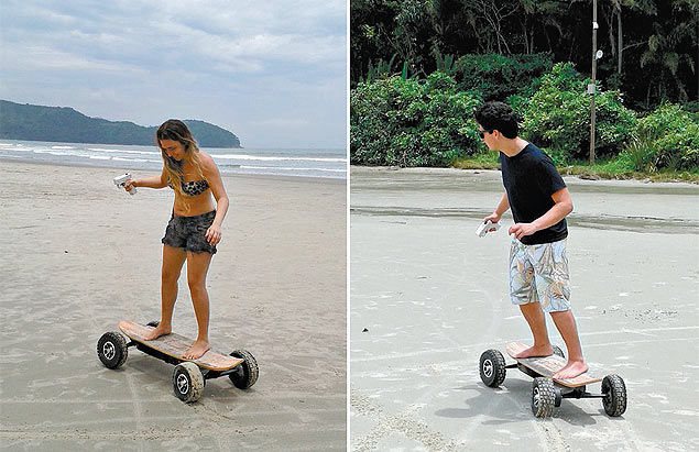 Luisa Prado, 19, e Rodrigo Schenkman, 18, se arriscam sobre o skate eltrico na praia da Baleia, litoral norte de So Paulo