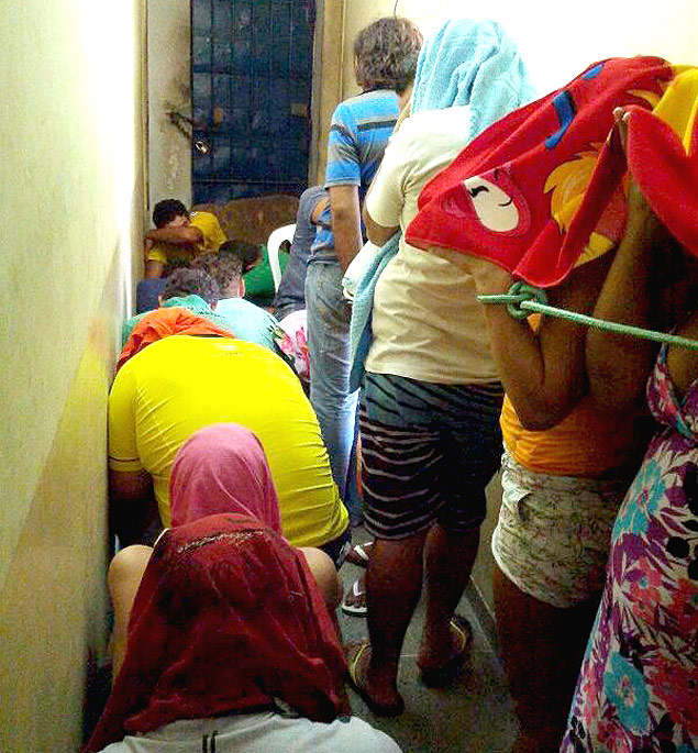 Presos da delegacia de Macau tem 17 presos amarrados em um corredor(Foto: Sinpol/Divulgação) 