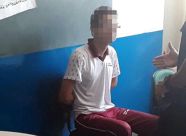 Adolescente após ter efetuado ataque a tiros a colegas de escola em Goiânia