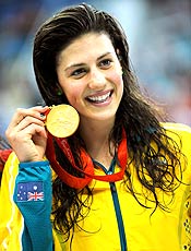 Stephanie Rice of Australia holds her gold medal for the women's 
400m individual medley swimming final at the National Aquatics Center 
during the Beijing 2008 Olympic Games, August 10, 2008. Rice set a new 
world record of 4 minutes 29.45 seconds. REUTERS/Kai Pfaffenbach 
(CHINA)