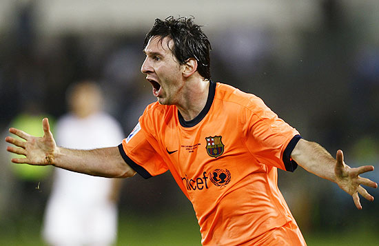 Barcelona's Lionel Messi celebrates his goal during their FIFA Club World Cup final soccer match against Estudiantes at Zayed Sports City stadium in Abu Dhabi December 19, 2009. REUTERS/Fahad Shadeed (UNITED ARAB EMIRATES - Tags: SPORT SOCCER)