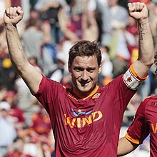 AS Roma forward Francesco Totti celebrates after scoring during the Serie A soccer match between AS Roma and Cagliari at Rome's Olympic stadium, Sunday May 9, 2010. AS Roma won 2-1. (AP Photo/Alessandra Tarantino) 