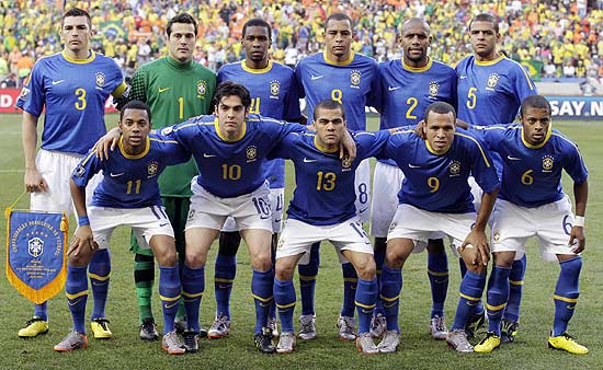Brazil players, front row from left, Robinho, Kaka, Daniel Alves,  Luis Fabiano, Michel Bastos, back row from left, Lucio, goalkeeper Julio  Cesar, Juan, Gilberto Silva, Maicon, and Felipe Melo, pose for a team  photo before the World Cup quarterfinal soccer match between the  Netherlands and Brazil at Nelson Mandela Bay Stadium in Port Elizabeth,  South Africa, Friday, July 2, 2010. (AP Photo/Matt Dunham)