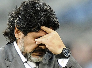 Argentina head coach Diego Maradona gestures during the World Cup quarterfinal soccer match between Argentina and Germany at the Green Point stadium in Cape Town, South Africa, Saturday, July 3, 2010. (AP Photo/Martin Meissner) 