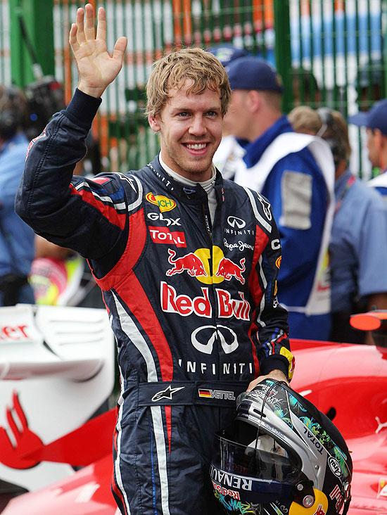 Sebastian Vettel comemora pole; clique na foto e veja imagens deste sábado do GP Brasil
