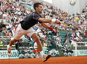 Novak Djokovic em ação contra o francês Nicolas Devilder