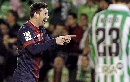 Messi comemora um de seus gols durante a partida entre Betis e Barcelona, pelo Campeonato Espanhol