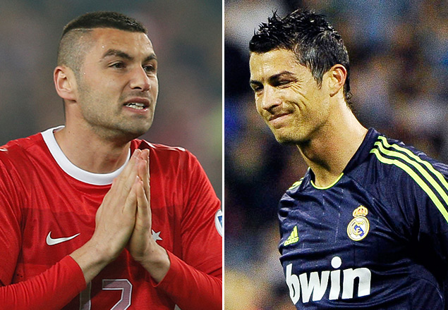 Os atacantes Burak Yilmaz, da seleo turca e do Galatasaray, e Cristiano Ronaldo, de Portugal e do Real Madrid