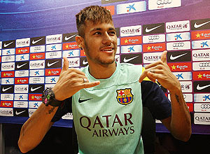 FC Barcelona's new Brazilian forward Neymar da Silva Santos Junior gestures during a press conference in Barcelona