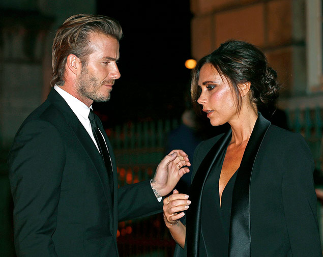 David Beckham e a sua mulher, Victoria Beckham, na Semana de Moda de Londres