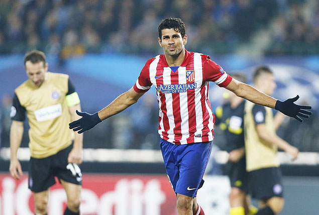 O atacante Diego Costa comemora um gol pelo Atltico de Madri pela Liga dos Campees