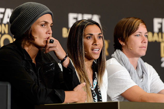 A brasileira Marta (centro) ao lado da alem Nadine Angerer e da americana Abby Wambach durante evento