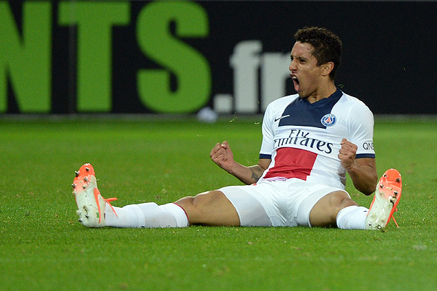 Paris' Brazilian defender Marquinhos reacts after scoring a goal during the French L1 football match Lille (LOSC) vs Paris Saint-Germain (PSG) on May 10, 2014 at the Pierre Mauroy stadium in Lille, nortthern France. AFP PHOTO / DENIS CHARLET ORG XMIT: LIL898