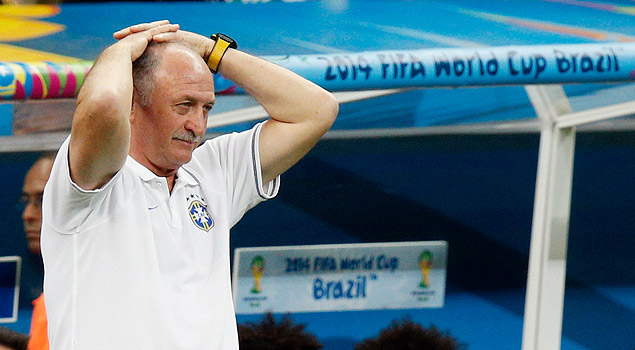 Brazil's coach Luiz Felipe Scolari reacts as his team plays against the Netherlands during their 2014 World Cup third-place playoff at the Brasilia national stadium in Brasilia July 12, 2014. REUTERS/Ueslei Marcelino (BRAZIL - Tags: SOCCER SPORT WORLD CUP) ORG XMIT: TIM38
