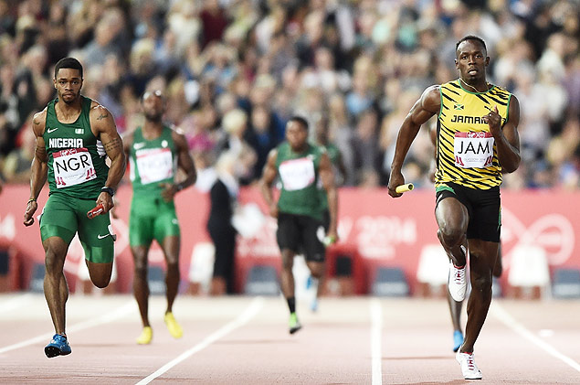 Usain Bolt corre durante prova do revezamento 4x100 m, no estdio Hampden Park, em Glasgow