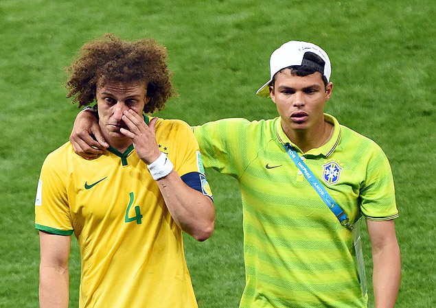  NIC. Belo Horizonte (Brazil), 08/07/2014.- Brazilian players David Luiz (L) and Thiago Silva (R) show their dejection after the FIFA World Cup 2014 semi final match between Brazil and Germany at the Estadio Mineirao in Belo Horizonte, Brazil, 08 July 2014. Germany won 7-1. (RESTRICTIONS APPLY: Editorial Use Only, not used in association with any commercial entity - Images must not be used in any form of alert service or push service of any kind including via mobile alert services, downloads to mobile devices or MMS messaging - Images must appear as still images and must not emulate match action video footage - No alteration is made to, and no text or image is superimposed over, any published image which: (a) intentionally obscures or removes a sponsor identification image; or (b) adds or overlays the commercial identification of any third party which is not officially associated with the FIFA World Cup) (Brasil, Alemania, Mundial de Ftbol) EFE/EPA/ANDREAS GEBERT EDITORIAL USE ONLY ORG XMIT: nic