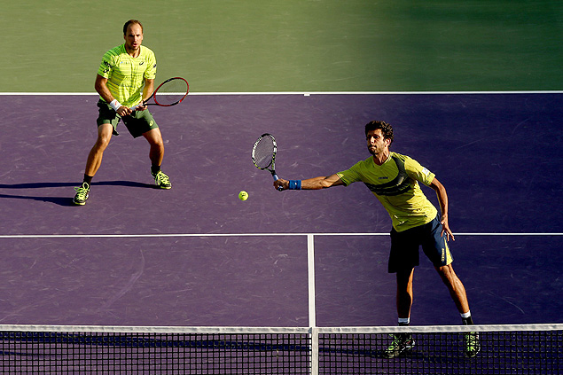 KEY BISCAYNE, FL - APRIL 02: Bruno Soares and Marcelo Melo of Brazil play Jack Sock and Vasek Pospisil of Canada during day 11 of the Miami Open Presented by Itau at Crandon Park Tennis Center on April 2, 2015 in Key Biscayne, Florida. Matthew Stockman/Getty Images/AFP == FOR NEWSPAPERS, INTERNET, TELCOS & TELEVISION USE ONLY ==