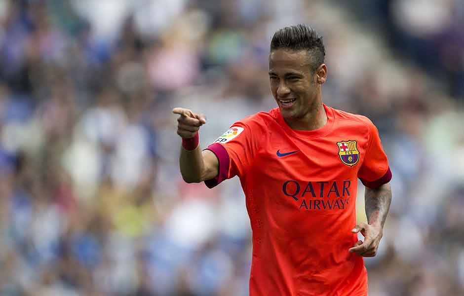 O atacante Neymar comemora o primeiro gol da vitria do Barcelona por 2 a 0 sobre o Espanyol