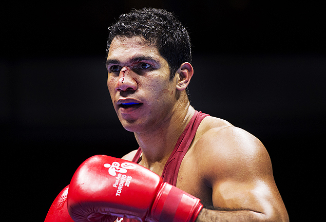Rafael Duarte Lima of Brazil is bloodied as he competes against Edgar Muoz Mata of Venezuela (out of frame) in the Men's Super Heavy (91+kg) Semifinals Bout at the at the Pan American Games July 23, 2015 in Toronto, Canada. AFP PHOTO/KEVIN VAN PAASSEN ORG XMIT: kvp