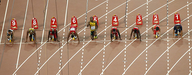 Largada dos 100 m rasos no Mundial de Pequim, em agosto, com Usain Bolt na raia 5