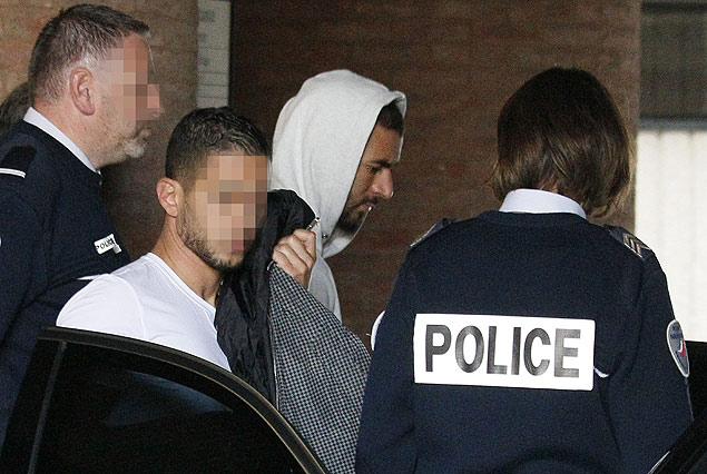 ALTERNATIVE CROP Real Madrid's French striker Karim Benzema leaves the court house in Versailles, near Paris, on November 5, 2015. Real Madrid striker Karim Benzema has admitted involvement in an alleged extortion case over a sex tape featuring fellow French international Mathieu Valbuena and appeared before judge today, legal sources said. The 27-year-old star told investigators he approached Valbuena about the tape on behalf of 