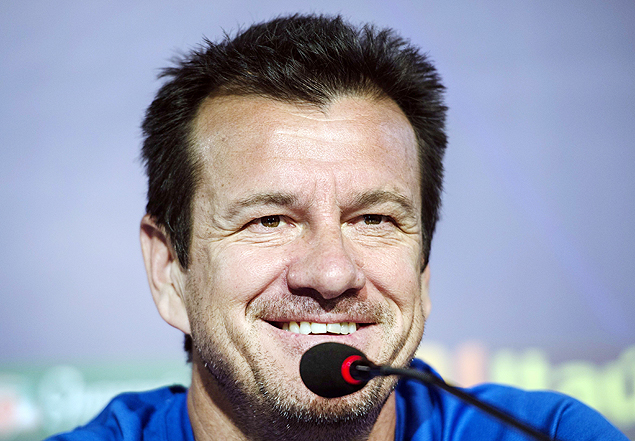 Brazilian coach Dunga smiles as he speaks during a press conference before a training session in Salvador, Brazil on November 16, 2015, on the eve of a FIFA World Cup Russia 2018 qualifier match against Peru. AFP PHOTO / CHRISTOPHE SIMON ORG XMIT: TOF728