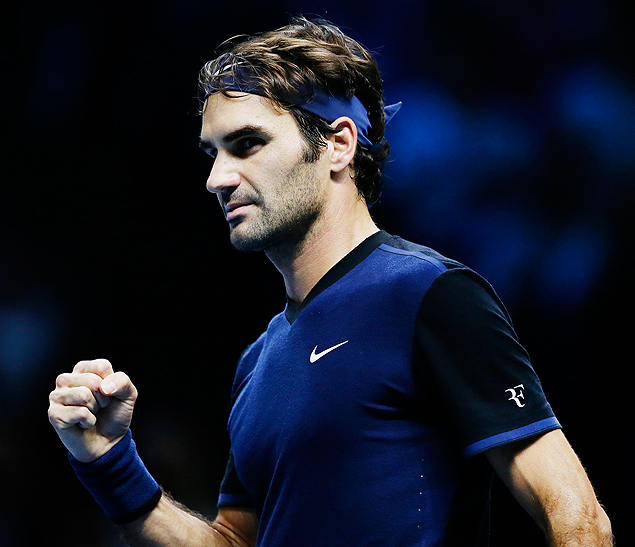 Switzerland's Roger Federer celebrates winning a point from Serbia's Novak Djokovic during their ATP World Tour Finals tennis match at the O2 Arena in London, England, Tuesday Nov. 17, 2015. (AP Photo/Tim Ireland) ORG XMIT: LTI138
