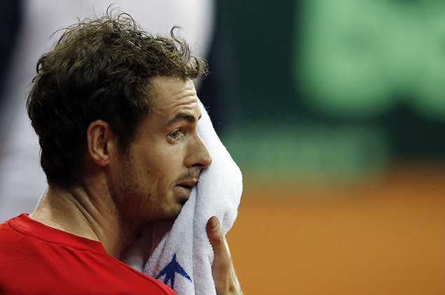 Britain's Andy Murray wipes his face with a towel as he takes part in a practice session ahead of the Davis Cup Final tennis match between Belgium and Britain, in Ghent, Belgium, Tuesday, Nov. 24, 2015. The final starts Friday and runs till Sunday. (AP Photo/Alastair Grant) ORG XMIT: XAG123