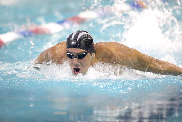 ORLANDO, FL - MARCH 03: Michael Phelps participates in his final heat of the Men 100 LC Meter Butterfly during day one of the Arena Pro Swim Series at the YMCA of Central Florida Aquatic Center on March 3, 2016 in Orlando, Florida. Phelps won the final race. Alex Menendez/Getty Images/AFP == FOR NEWSPAPERS, INTERNET, TELCOS & TELEVISION USE ONLY ==