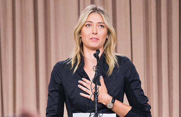 TOPSHOT - Russian tennis player Maria Sharapova speaks at a press conference in downtown Los Angeles, California, March 7, 2016. The former world number one announced she failed a doping test at the Australian Open, saying a change in the World-Anti-Doping Agency banned list led to the violation. Sharapova said she tested positive for Meldonium, a substance she had been taking since 2006 but one that was added to the banned list this year. / AFP / ROBYN BECK ORG XMIT: RLB275
