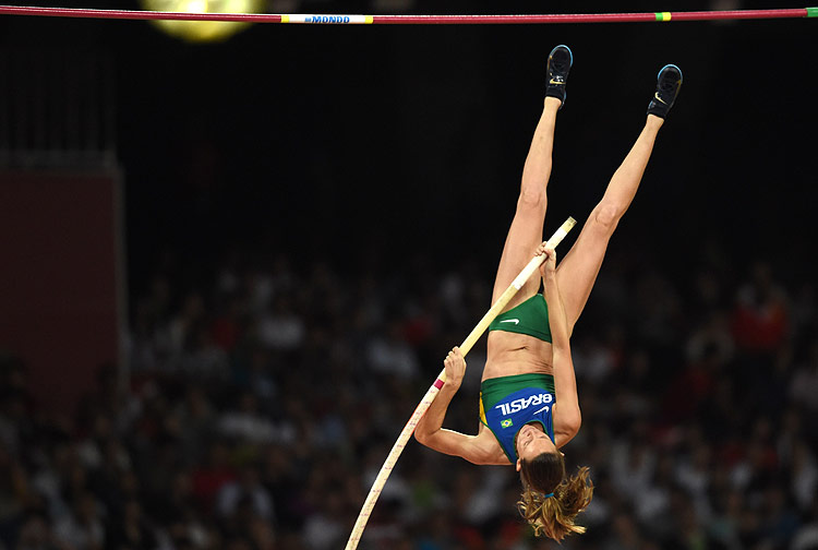 Brazil's Fabiana Murer competes in the women's pole vault athletics event at the 2015 IAAF World Championships at the "Bird's Nest" National Stadium in Beijing on August 26, 2015. AFP PHOTO / JOHANNES EISELE ORG XMIT: DD012