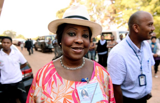 (FILES) This file photo taken on October 25, 2013 shows United Nation representative in Madagascar Fatma Samoura arriving to inspect a polling station in Antananarivo during the presidential elections. FIFA named a Senegalese UN diplomat Fatma Samoura, 54, as its first ever female secretary general on May 13, 2016, a surprise and historic move announced at a congress to overhaul the scandal-plagued organization. Samoura comes from outside the football world, having worked with the United Nations for 21 years. She is currently based in Nigeria for the UN Development Program. / AFP PHOTO / STEPHANE DE SAKUTIN ORG XMIT: SDS1391