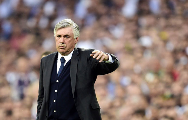 Real Madrid's Italian coach Carlo Ancelotti gestures during the UEFA Champions League semi-final second leg football match Real Madrid FC vs Juventus at the Santiago Bernabeu stadium in Madrid on May 13, 2015. 