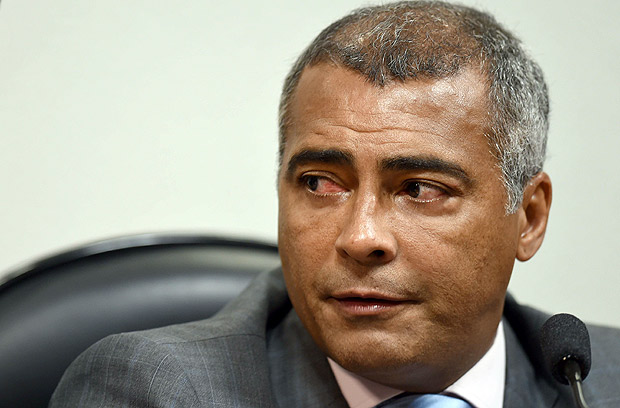 Former Brazilian football star and current senator Romario attends the opening session of the parliamentary committee of inquiry into corruption in the Brazilian football and the 2014 World Cup organizing committee, at the National congress in Brasilia on 14 July 2015, where Romario was elected as president of the commission. AFP PHOTO/EVARISTO SA ORG XMIT: ESA306