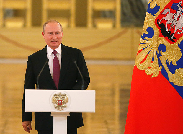 Putin durante evento com os atletas russos que disputaro da Rio-2016
