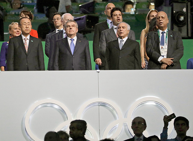 U.N. Secretary General Ban Ki-moon, left, IOC President Thomas Bach, second left, Brazil's interim President Michel Temer attends the opening ceremony for the 2016 Summer Olympics in Rio de Janeiro, Brazil, Friday, Aug. 5, 2016. (AP Photo/David Goldman) ORG XMIT: OLY159