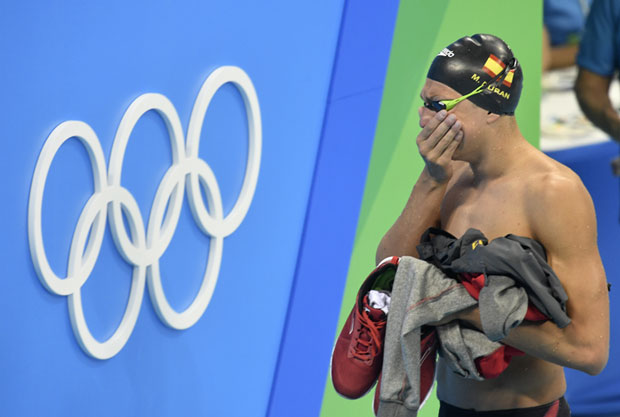 Spain's Miguel Duran Navia cries as he leaves the hall prior to a men's 400m freestyle heat during the swimming competitions at the 2016 Summer Olympics, Saturday, Aug. 6, 2016, in Rio de Janeiro, Brazil. (AP Photo/Martin Meissner) ORG XMIT: OSWM327